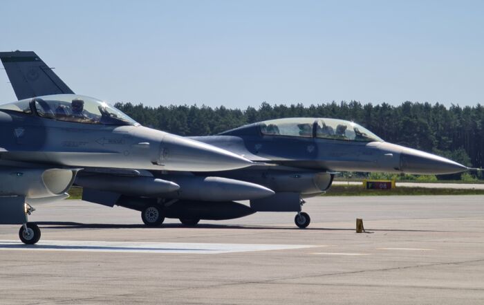 Two F-16 aircraft standing on the tarmac