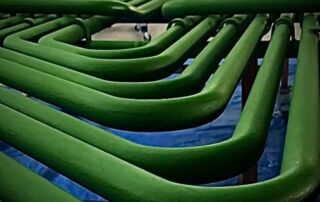 Green coils of rubber hoses